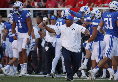 Sep 10, 2016; Salt Lake City, UT, USA; Brigham Young Cougars head coach Kalani Sitake reacts to a fumble recovery in the first quartet against the Utah Utes at Rice-Eccles Stadium. Mandatory Credit: Jeff Swinger-USA TODAY Sports