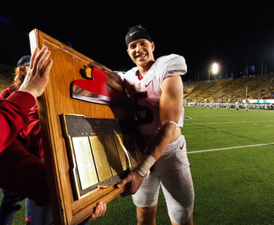 Nov 19, 2016; Berkeley, CA, USA; Stanford Cardinal running back Christian McCaffrey (5) holds the Stanford Axe after a win over the California Golden Bears at Memorial Stadium. Stanford defeated California 45-31. Mandatory Credit: Kelley L Cox-USA TODAY Sports