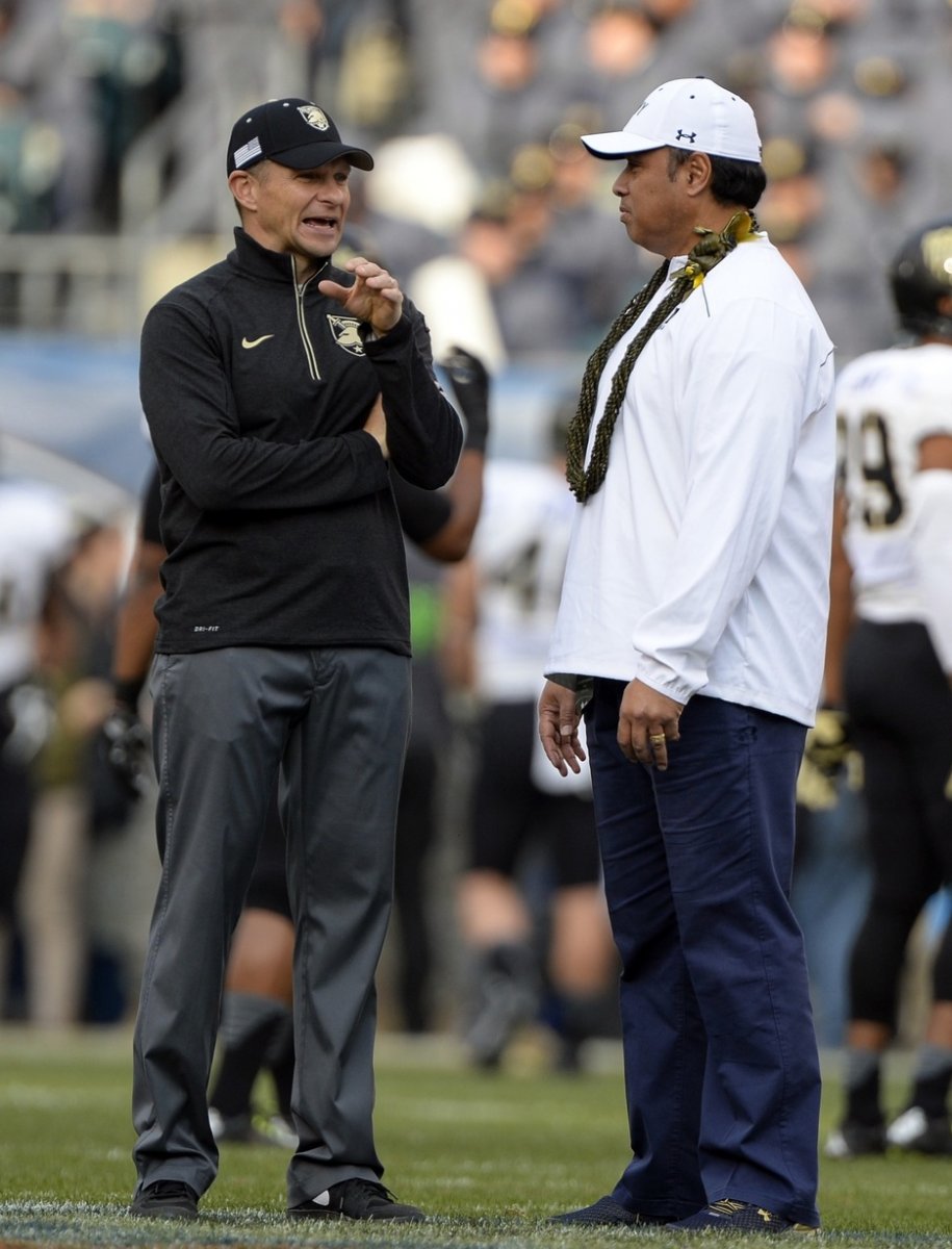 Former colleagues Monken and Niumatalolo speak on the field before the 2015 Army-Navy game - Tommy Gilligan-USA TODAY Sports