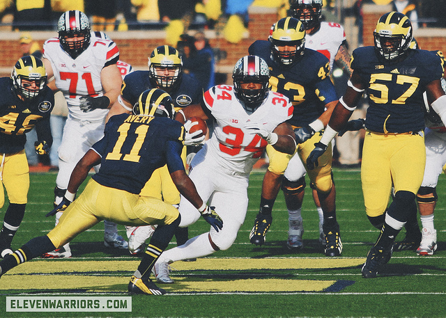 Carlos Hyde runs vs. Michigan in 2013