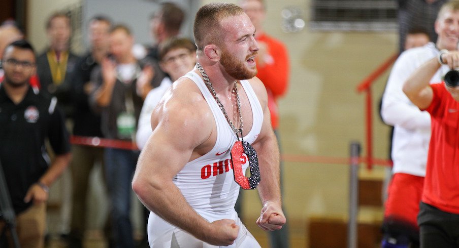 Kyle Snyder celebrates with the Ohio State wrestling team's "pin chain."