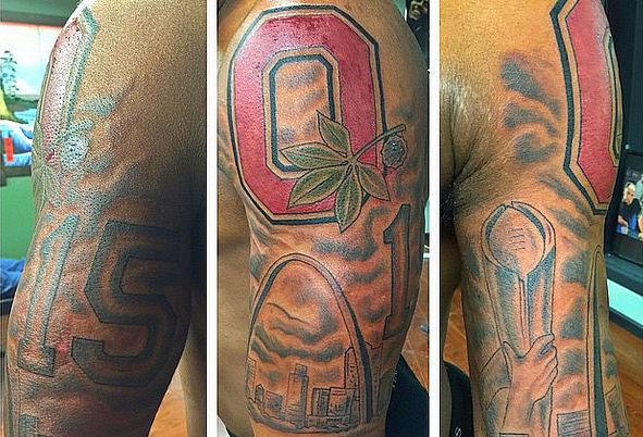 Ezekiel Elliott's New Tattoo: From St. Louis to the Top of the World |  Eleven Warriors