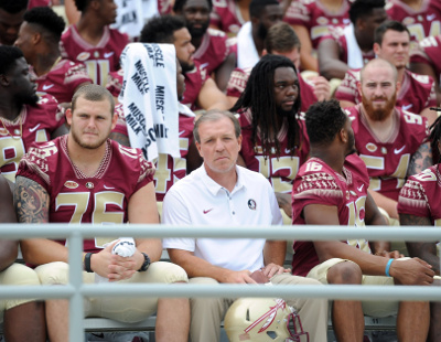 Aug 6, 2017; Tallahassee, FL, USA; Florida State Seminoles head coach Jimbo Fisher and his team prepare for their team photo during Media Day at Doak Campbell Stadium. Mandatory Credit: Melina Vastola-USA TODAY Sports