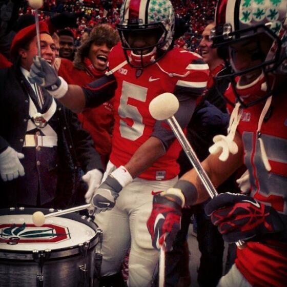 urban meyer and devin smith celebrate beating michigan 26-21 in 2012
