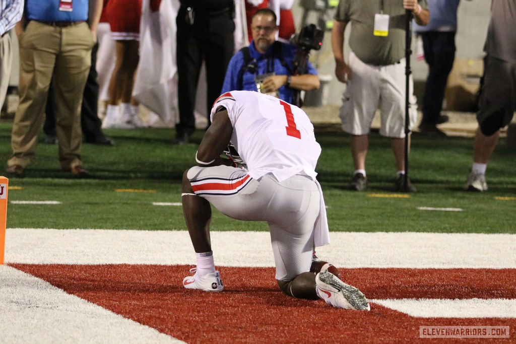 Johnnie Dixon after scoring a 59-yard touchdown against Indiana.