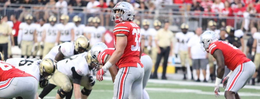 Tuf Borland came off the bench to lead Ohio State in tackles with a career-high 12. 