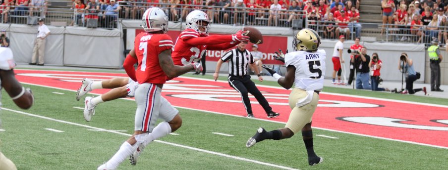 Erick Smith saved a touchdown with this pass break up intended for Army's Kell Walker. 