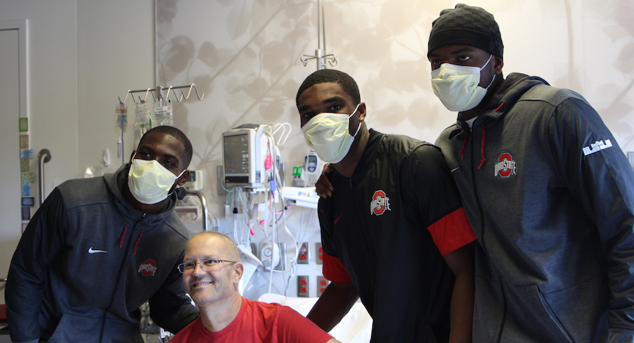 J.T. Barrett, Jeffrey Okudah and Jaylen Harris with Chris Bradley