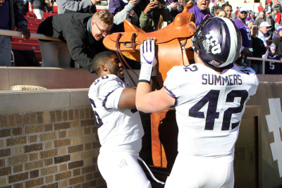 Nov 18, 2017; Lubbock, TX, USA; The TCU Horned Frogs celebrate with the West Texas Championship trophy after beating the Texas Tech Red Raiders at Jones AT&T Stadium. Mandatory Credit: Michael C. Johnson-USA TODAY Sports