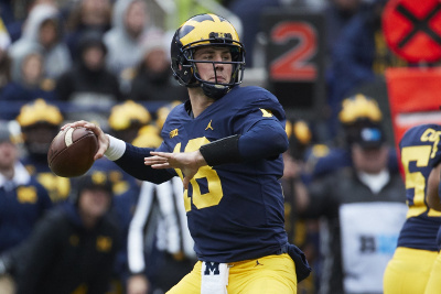 Oct 28, 2017; Ann Arbor, MI, USA; Michigan Wolverines quarterback Brandon Peters (18) passes in the second half against the Rutgers Scarlet Knights at Michigan Stadium. Mandatory Credit: Rick Osentoski-USA TODAY Sports Oct 28, 2017; Ann Arbor, MI, USA; Michigan Wolverines quarterback Brandon Peters (18) passes in the second half against the Rutgers Scarlet Knights at Michigan Stadium. Mandatory Credit: Rick Osentoski-USA TODAY Sports