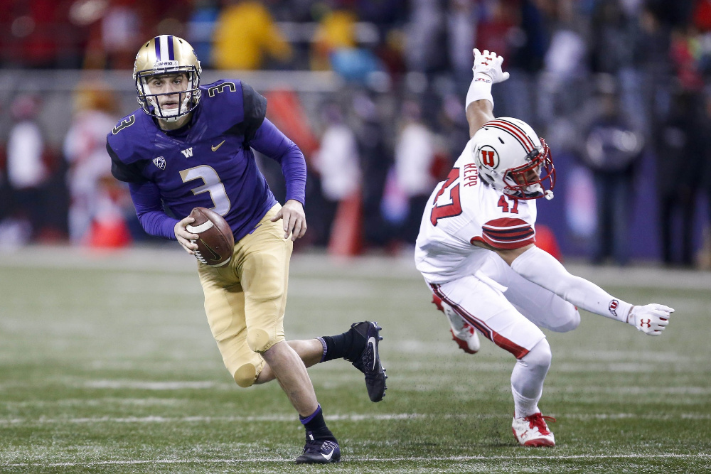 Nov 18, 2017; Seattle, WA, USA; Washington Huskies quarterback Jake Browning (3) escapes from Utah Utes defensive end Caleb Repp (47) during the second half at Husky Stadium. Mandatory Credit: Jennifer Buchanan-USA TODAY Sports