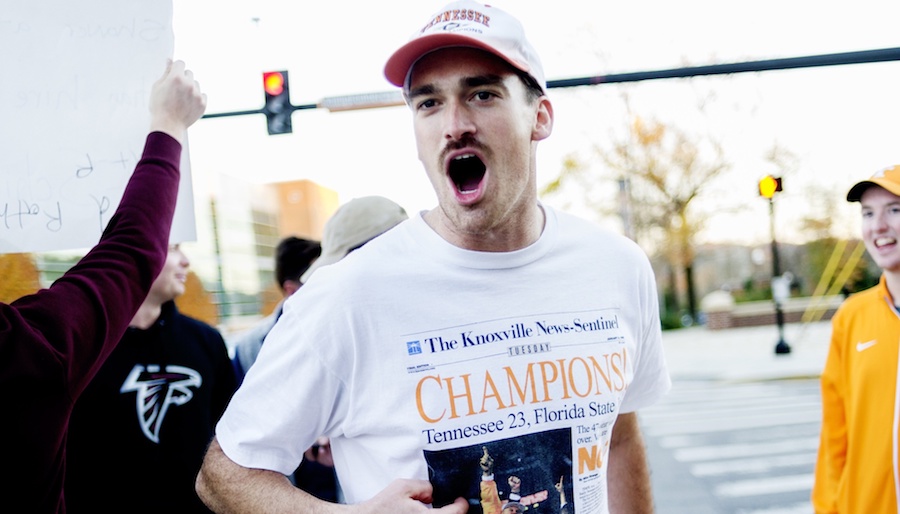 Nov 26, 2017; Knoxville, TN, USA; Tennessee Volunteers fan Jake McCallister of Knoxville chants outside of the UT Athletics offices during a gathering of Volunteers fans as they react to the possible hiring of Ohio State Buckeyes defensive coordinator Greg Schiano for the Volunteers head coaching position. Mandatory Credit: Calvin Mattheis/Knoxville News Sentinel via USA TODAY NETWORK