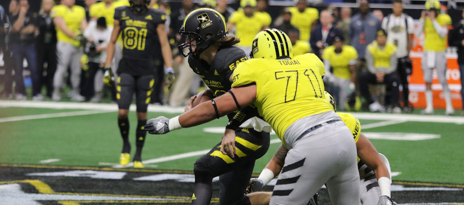 Tommy Togiai makes a tackle.