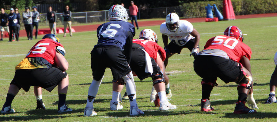 J.T. Barrett takes a snap during East-West Shrine Game practice. J.T. Barrett takes a snap during East-West Shrine Game practice.