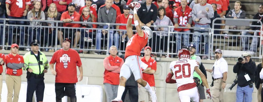 Austin Mack high-points the football against Oklahoma. Austin Mack high-points the football against Oklahoma.