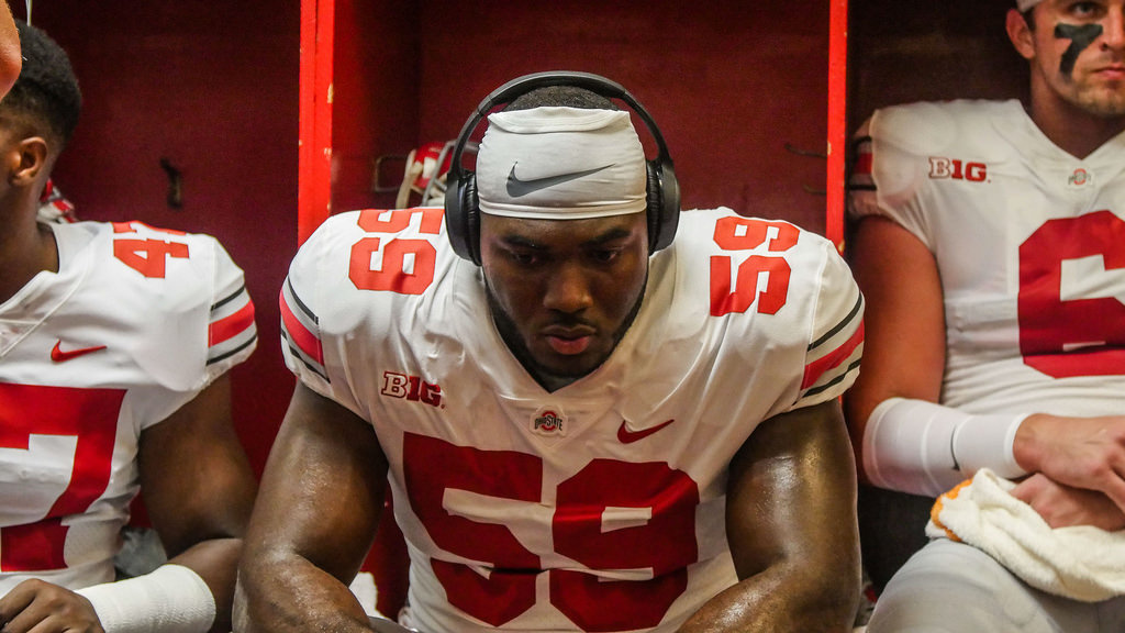 Tyquan Lewis in the Ohio State football locker room.