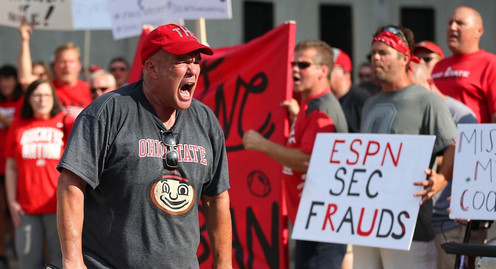 Aug 6, 2018; Columbus, OH, USA; Jeff Hamms leads the rally in support of Ohio State Buckeyes coach Urban Meyer at a rally held at Ohio Stadium on Monday at The North Rotunda. Mandatory Credit: Joe Maiorana-USA TODAY Sports