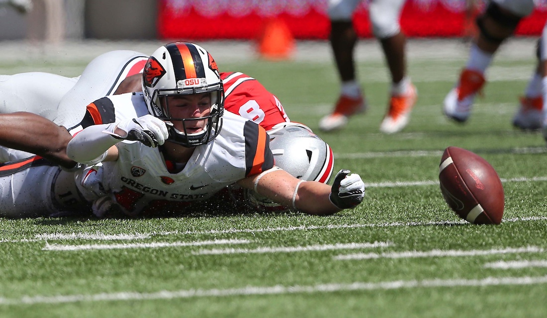 Sep 1, 2018; Columbus, OH, USA; Oregon State Beavers wide receiver Timmy Hernandez (18) loses the ball as Ohio State Buckeyes cornerback Kendall Sheffield (8) defends during the first quarter at Ohio Stadium. Mandatory Credit: Joe Maiorana-USA TODAY Sports