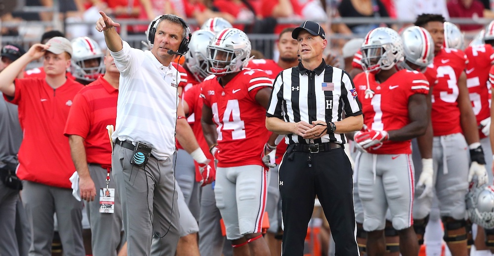 Oct 6, 2018; Columbus, OH, USA; Ohio State Buckeyes head coach Urban Meyer disputes a call while reviewing the replay during the second quarter at Ohio Stadium. Mandatory Credit: Joe Maiorana-USA TODAY Sports