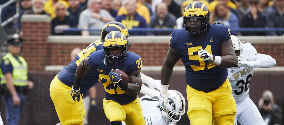 Karan Higdon and Cesar Ruiz