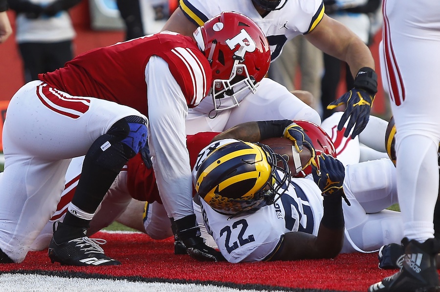Nov 10, 2018; Piscataway, NJ, USA; Michigan Wolverines running back Karan Higdon (22) scores a touchdown against the Rutgers Scarlet Knights during the first half at High Point Solutions Stadium. Mandatory Credit: Noah K. Murray-USA TODAY Sports