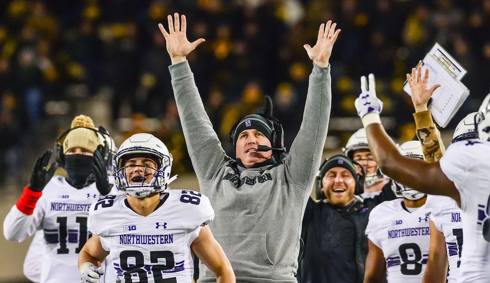 Nov 10, 2018; Iowa City, IA, USA; Northwestern Wildcats head coach Pat Fitzgerald and the Wildcats bench react during the fourth quarter after a touchdown against the Iowa Hawkeyes at Kinnick Stadium. Mandatory Credit: Jeffrey Becker-USA TODAY Sports