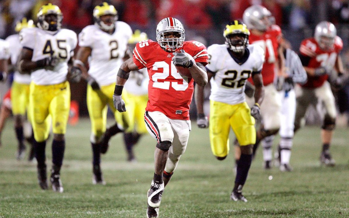 Antonio Pittman runs away. Antonio Pittman runs away.