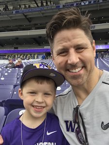 Ryan Day and his son at a Washington football game