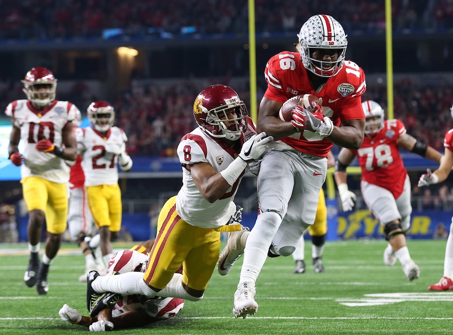 Dec 29, 2017; Arlington, TX, USA; Ohio State Buckeyes quarterback J.T. Barrett (16)runs for a touchdown in the second quarter against Southern California Trojans cornerback Iman Marshall (8) in the 2017 Cotton Bowl at AT&T Stadium. Mandatory Credit: Matthew Emmons-USA TODAY Sports Dec 29, 2017; Arlington, TX, USA; Ohio State Buckeyes quarterback J.T. Barrett (16)runs for a touchdown in the second quarter against Southern California Trojans cornerback Iman Marshall (8) in the 2017 Cotton Bowl at AT&T Stadium. Mandatory Credit: Matthew Emmons-USA TODAY Sports