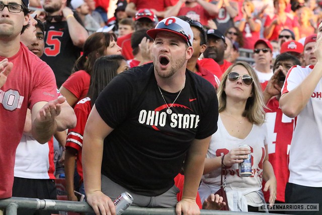 Ohio State fans enjoying the game and a drink