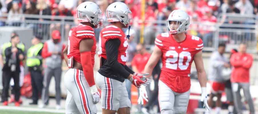 Baron Browning, Malik Harrison and Pete Werner