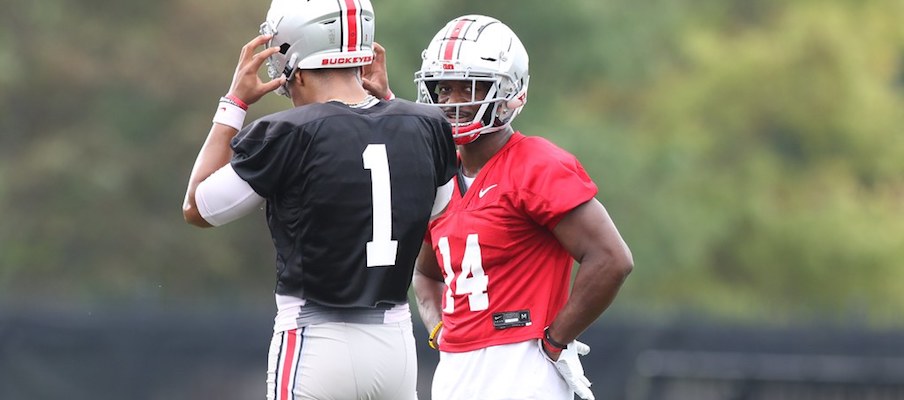 Justin Fields and K.J. Hill 