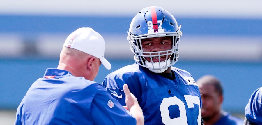 Jul 25, 2019; East Rutherford, NJ, USA; New York Giants defensive tackle Dexter Lawrence (97) talks with defensive coordinator James Bettcher during the first day of training camp at Quest Diagnostics Training Center. Mandatory Credit: Vincent Carchietta-USA TODAY Sports