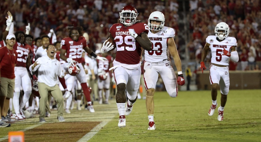 Sep 7, 2019; Norman, OK, USA; Oklahoma Sooners running back Rhamondre Stevenson (29) runs for a touchdown during the second half against the South Dakota Coyotes at Gaylord Family - Oklahoma Memorial Stadium. Mandatory Credit: Kevin Jairaj-USA TODAY Sports