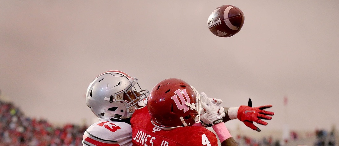 Oct 3, 2015; Bloomington, IN, USA; Ohio State Buckeyes cornerback Eli Apple (13) knocks the ball away from Indiana Hoosiers wide receiver Ricky Jones (4) on the last play of the game at Memorial Stadium. Mandatory Credit: Matt Kryger-USA TODAY Sports