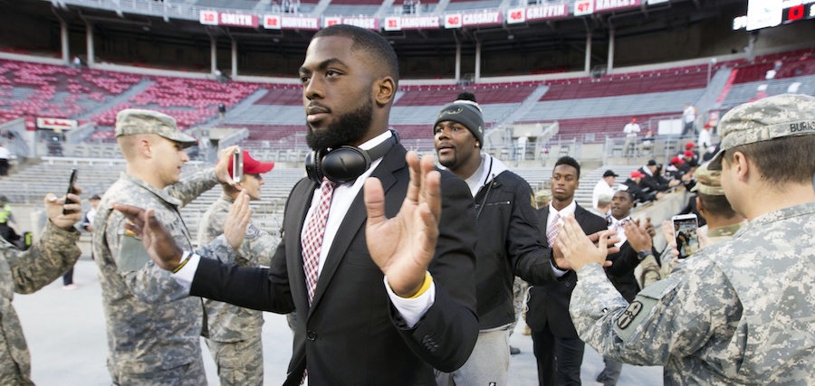 Nov 5, 2016; Columbus, OH, USA; Ohio State Buckeyes quarterback J.T. Barrett (16), followed by former Ohio State and current Buffalo Bills quarterback Cardale Jones, greets members of the National Guard before the game against the Nebraska Cornhuskers at Ohio Stadium. Mandatory Credit: Greg Bartram-USA TODAY Sports
