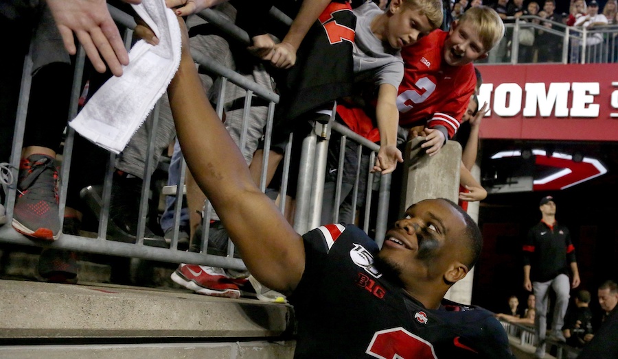 Oct 5, 2019; Columbus, OH, USA; Ohio State Buckeyes running back J.K. Dobbins (2) celebrates with fans after the game against the Michigan State Spartans at Ohio Stadium. Mandatory Credit: Joe Maiorana-USA TODAY Sports