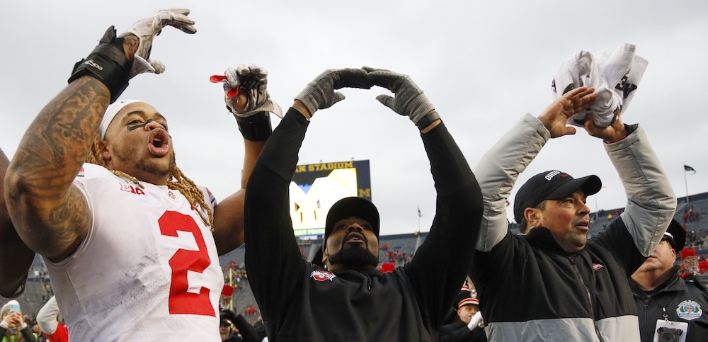 Nov 30, 2019; Ann Arbor, MI, USA; Ohio State Buckeyes defensive end Chase Young (2) linebackers coach Al Washington and head coach Ryan Day celebrate after defeating the Michigan Wolverines at Michigan Stadium. Mandatory Credit: Rick Osentoski-USA TODAY Sports