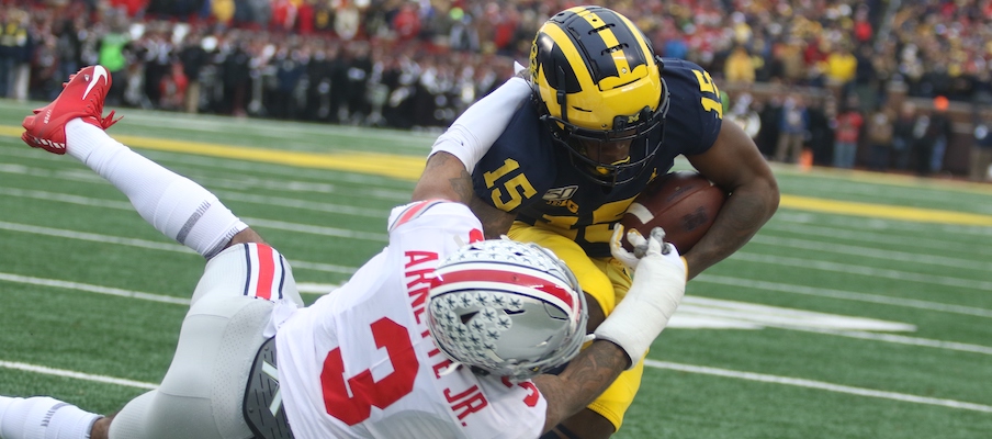 Damon Arnette tackles a Michigan man