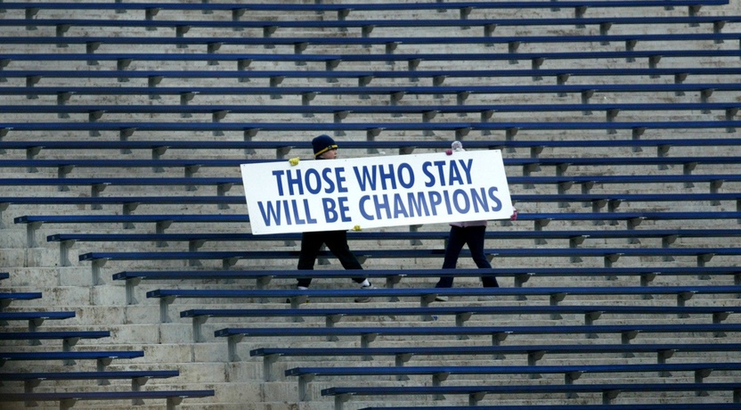 Children carry a sign of Bo Schembechler's famous motto during the Celebration of Bo's Life service, on Tuesday, Nov. 21, 2006 in Ann Arbor at Michigan Stadium. The service was for former legendary University of Michigan Bo Schembechler. Bo 112106 Rr09