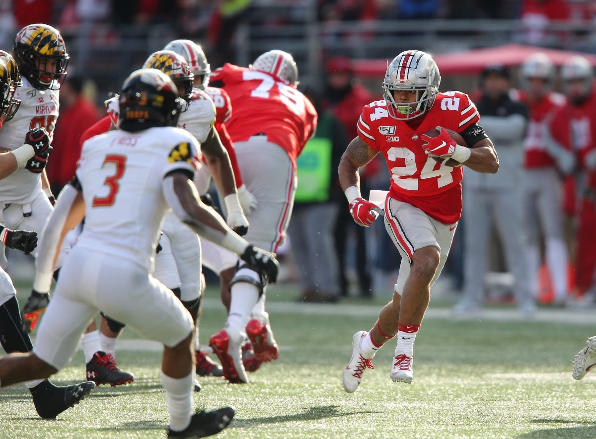 Nov 9, 2019; Columbus, OH, USA; Ohio State Buckeyes running back Marcus Crowley (24) runs against the Maryland Terrapins during the third quarter at Ohio Stadium. Mandatory Credit: Joe Maiorana-USA TODAY Sports