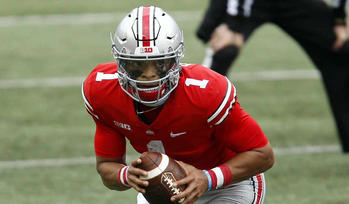 Oct 24, 2020; Columbus, Ohio, USA; Ohio State Buckeyes quarterback Justin Fields (1) runs during the third quarter against the Nebraska Cornhuskers at Ohio Stadium. Mandatory Credit: Joseph Maiorana-USA TODAY Sports