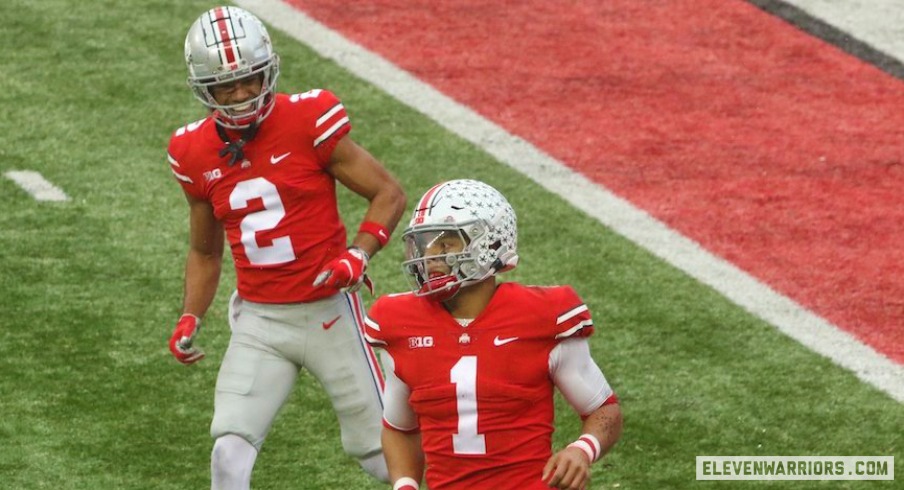 Chris Olave celebrates his touchdown