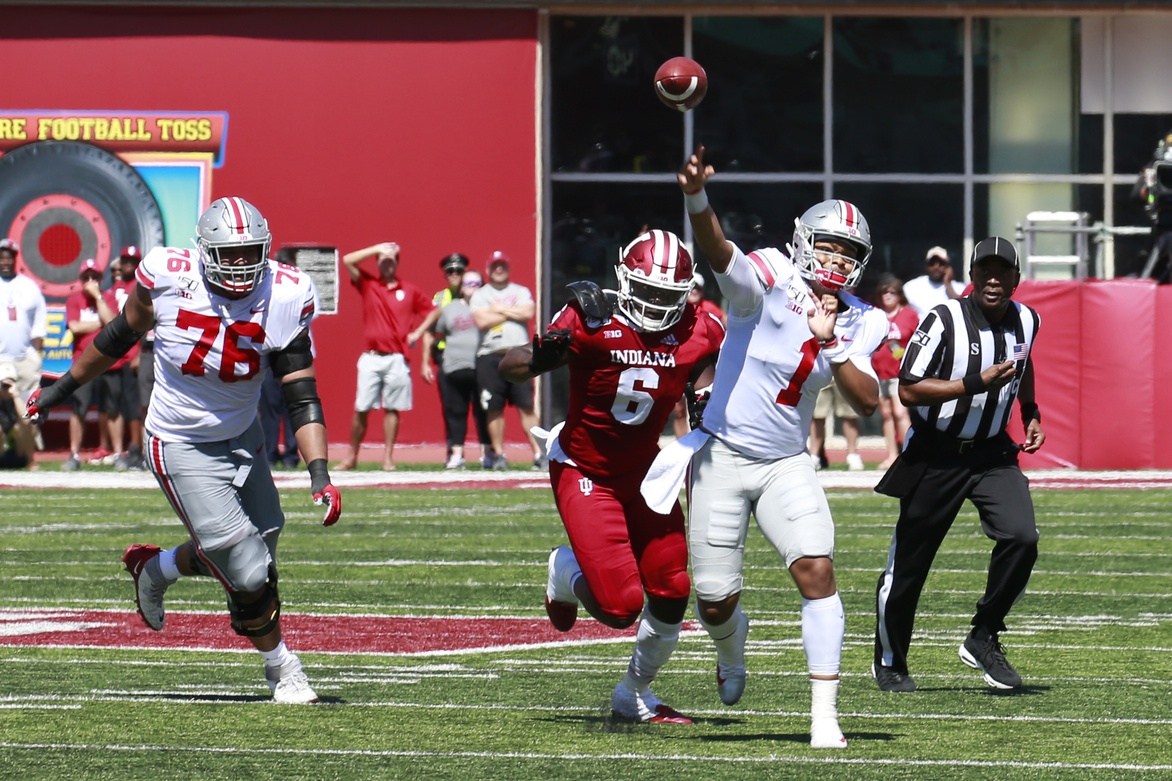 Sep 14, 2019; Bloomington, IN, USA; Ohio State Buckeyes quarterback Justin Fields (1) throws a pass against the Indiana Hoosiers during the second quarter at Memorial Stadium . Mandatory Credit: Brian Spurlock-USA TODAY Sports