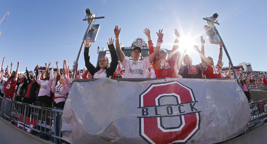 The Ohio State Block O student section cheers on the Buckeyes during a 2016 game. If students have to spread out in the section, the two sections popular card stunts may not be viable.
