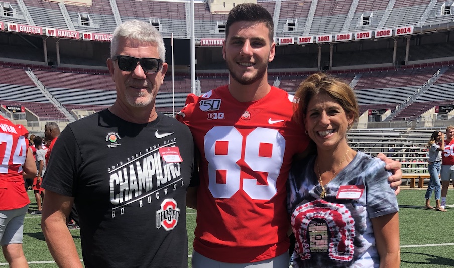 Luke Farrell and his parents