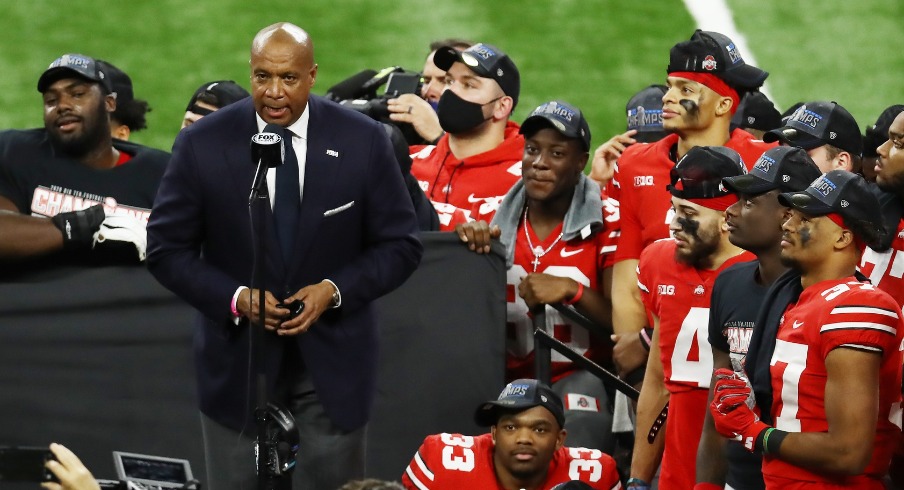 Dec 19, 2020; Indianapolis, Indiana, USA; Big 10 Conference commissioner Kevin Warren introduces the Ohio State Buckeyes after their victory over the Northwestern Wildcats at Lucas Oil Stadium. Mandatory Credit: Aaron Doster-USA TODAY Sports