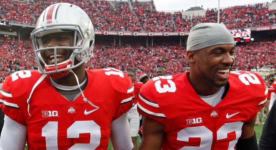 Ohio State Buckeyes safety Tyvis Powell (23) and Ohio State Buckeyes quarterback Cardale Jones (12) celebrate their win over Michigan Wolverines at Ohio Stadium in Columbus, Ohio on November 29, 2014.