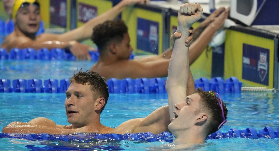 Jun 15, 2021; Omaha, Nebraska, USA; Ryan Murphy (left) and Hunter Armstrong (right) celebrate after the Men s 100m Backstroke Finals during the U.S. Olympic Team Trials Swimming competition at CHI Health Center Omaha. Mandatory Credit: Rob Schumacher-USA TODAY Sports