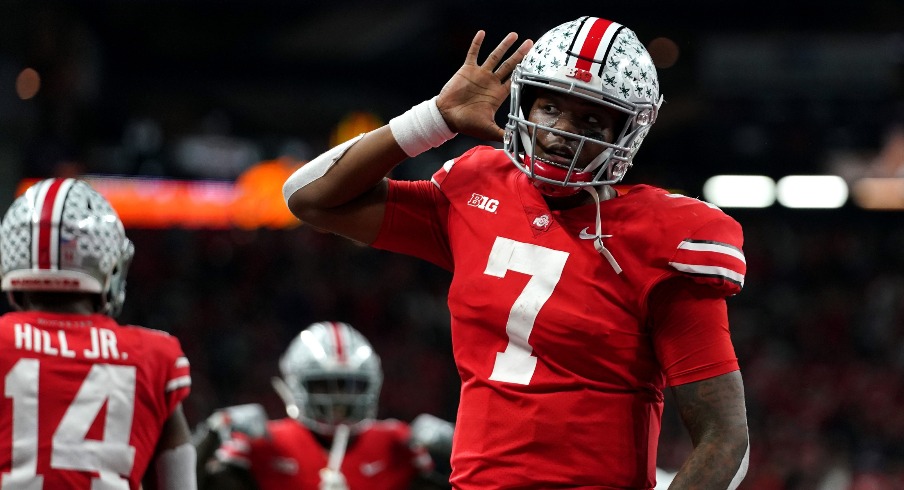 Dec 1, 2018; Indianapolis, IN, USA; Ohio State Buckeyes quarterback Dwayne Haskins (7) celebrates with teammates after throwing a touchdown pass against the Northwestern Wildcats in the first half in the Big Ten conference championship game at Lucas Oil Stadium. Mandatory Credit: Aaron Doster-USA TODAY Sports